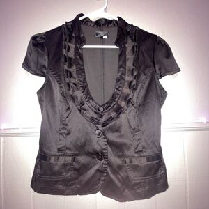 Black cardigan with pockets and front button.